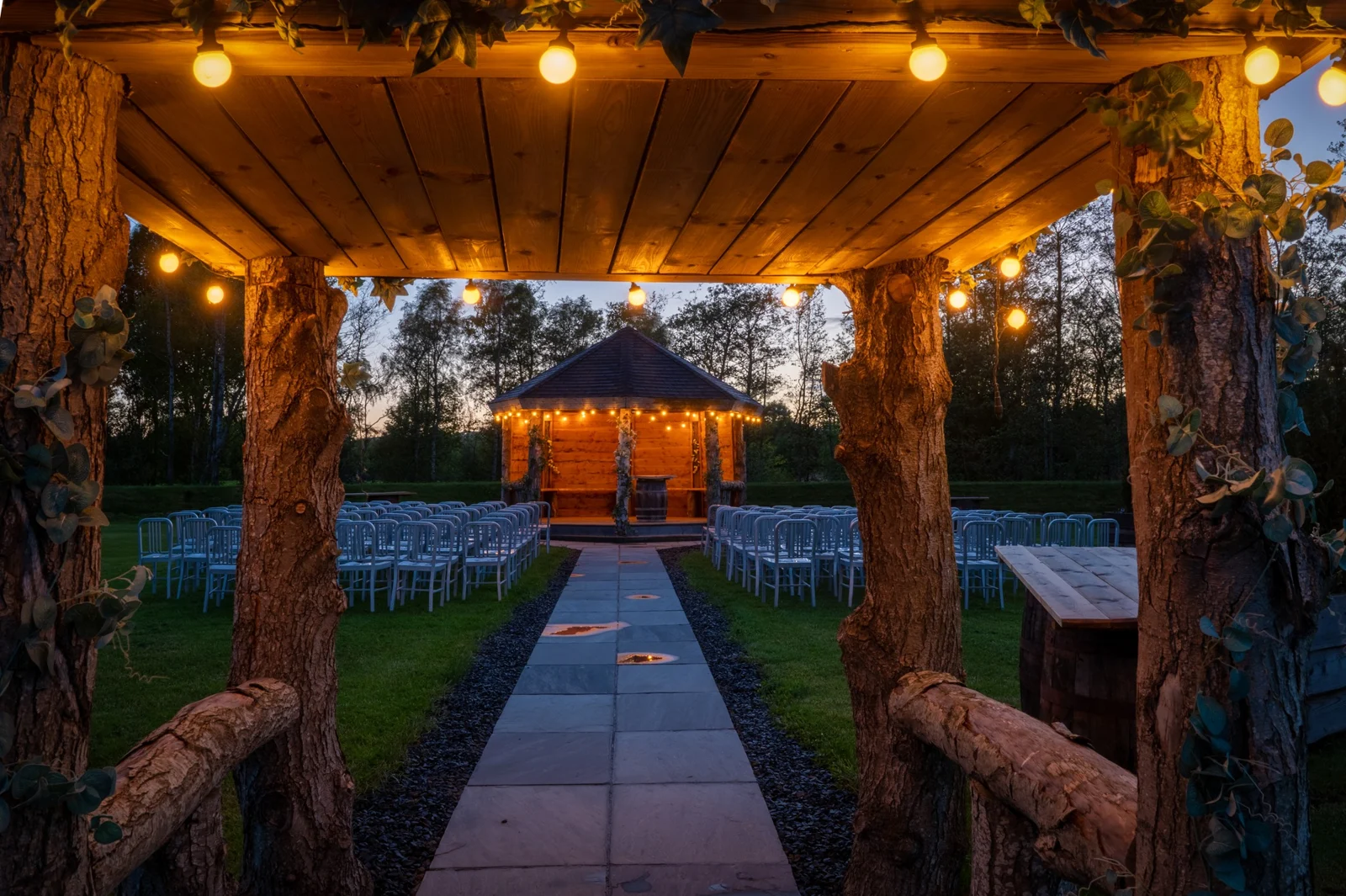 Silverwood’s outdoor ceremony setting and pagoda lit up at dusk